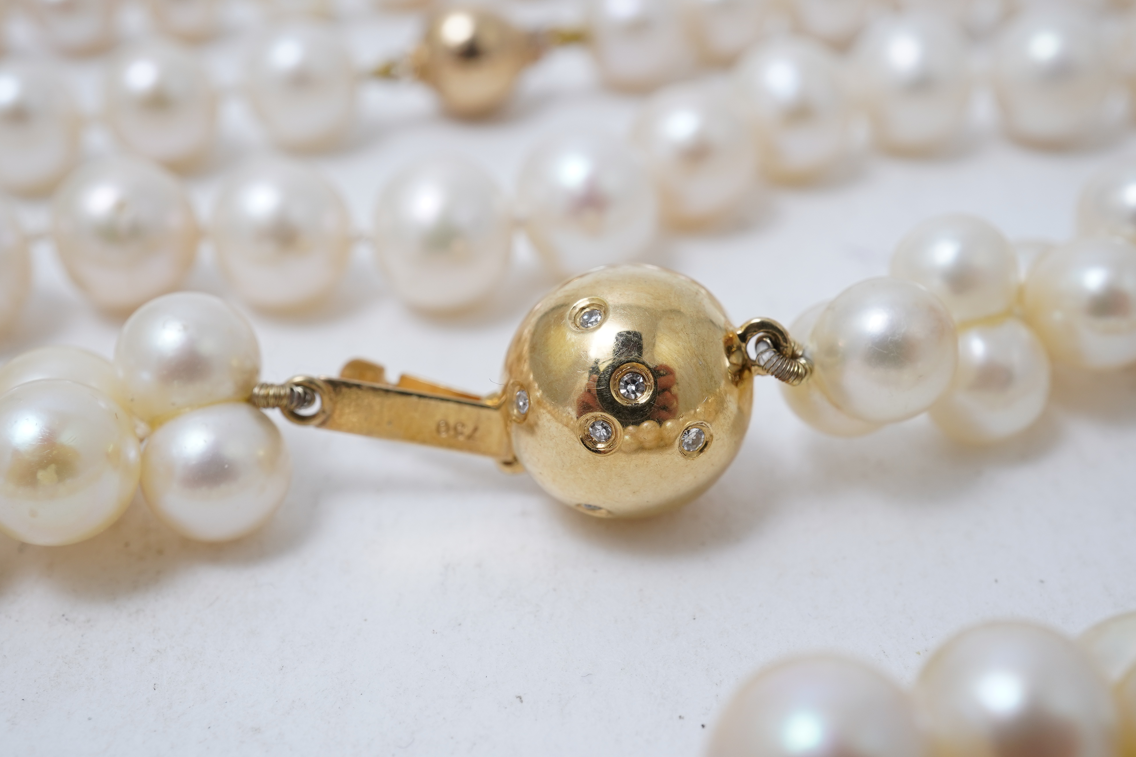 A collection of four cultured pearl necklaces